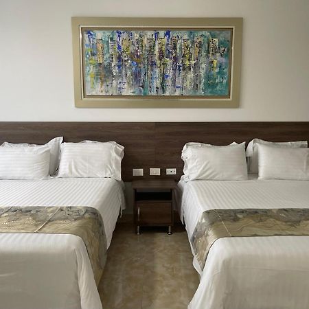 Hotel Royal Elim International Cali Εξωτερικό φωτογραφία A room at the hotel