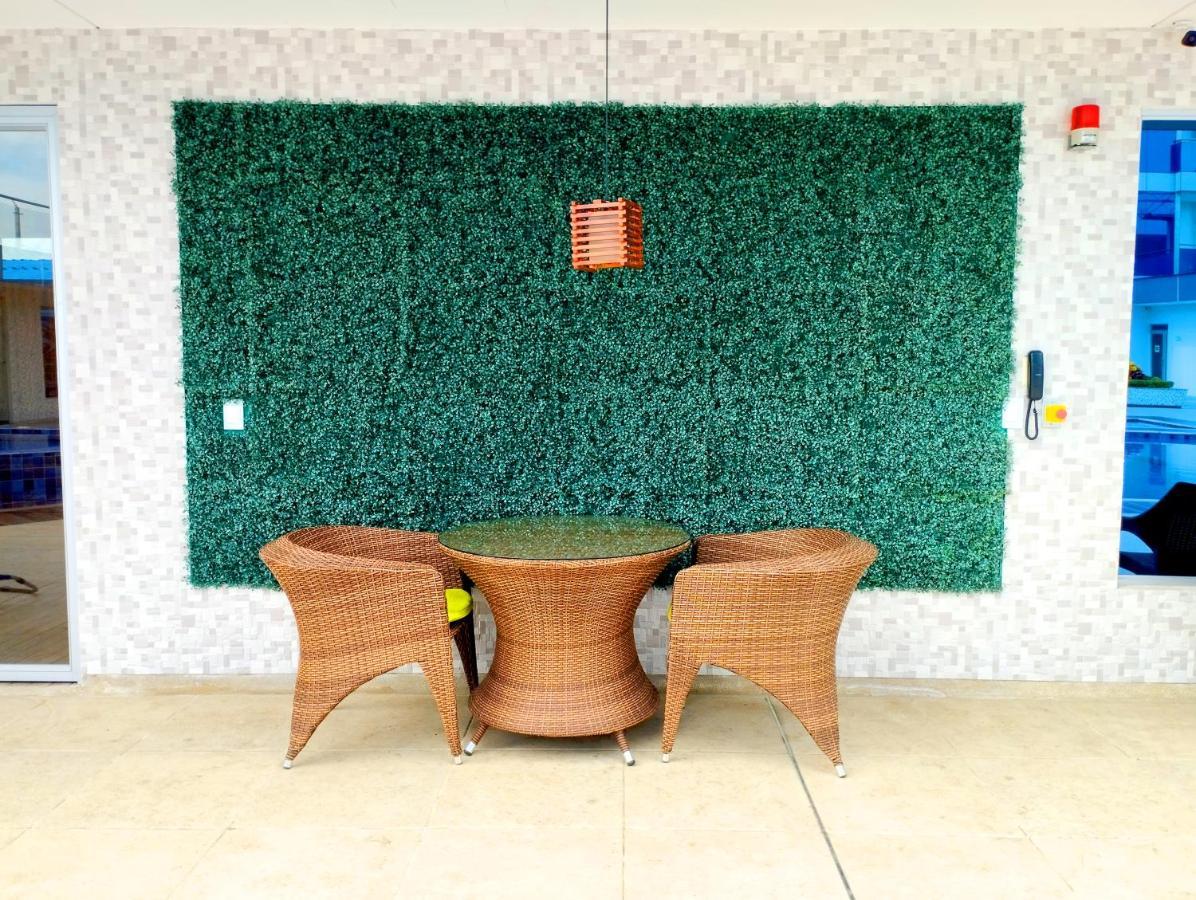 Hotel Royal Elim International Cali Εξωτερικό φωτογραφία Artificial green wall