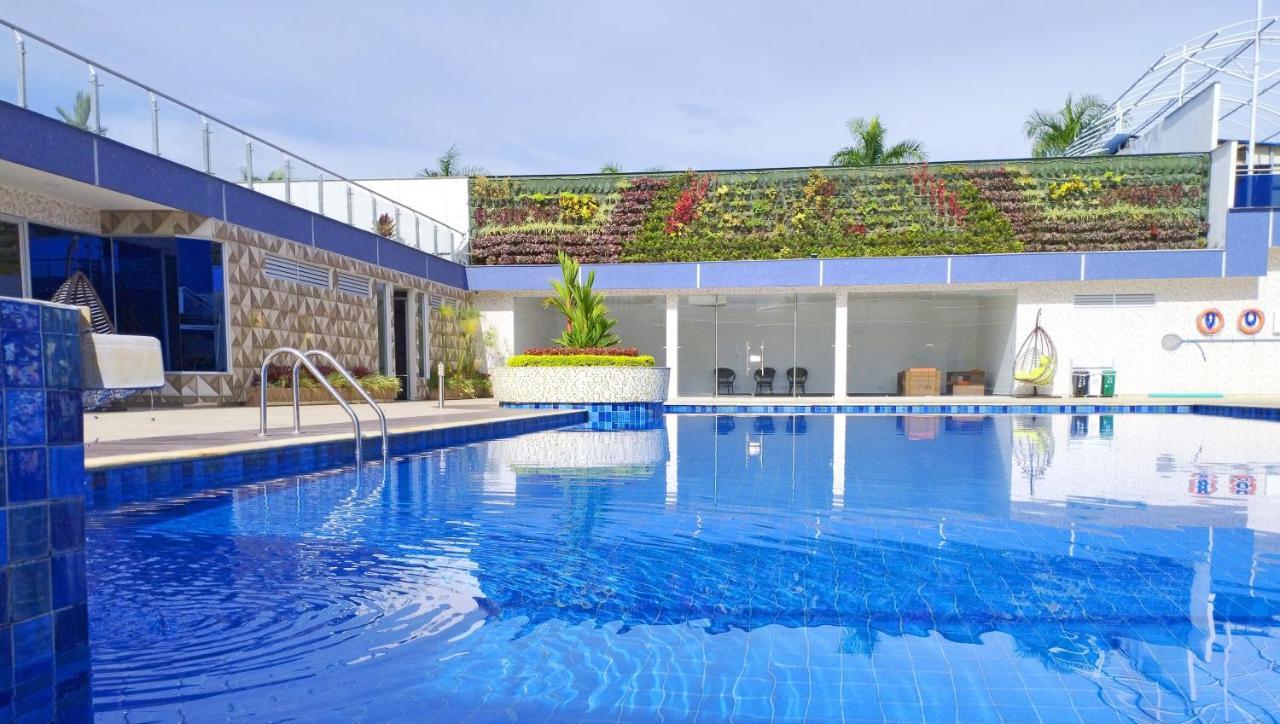 Hotel Royal Elim International Cali Εξωτερικό φωτογραφία The swimming pool at the hotel