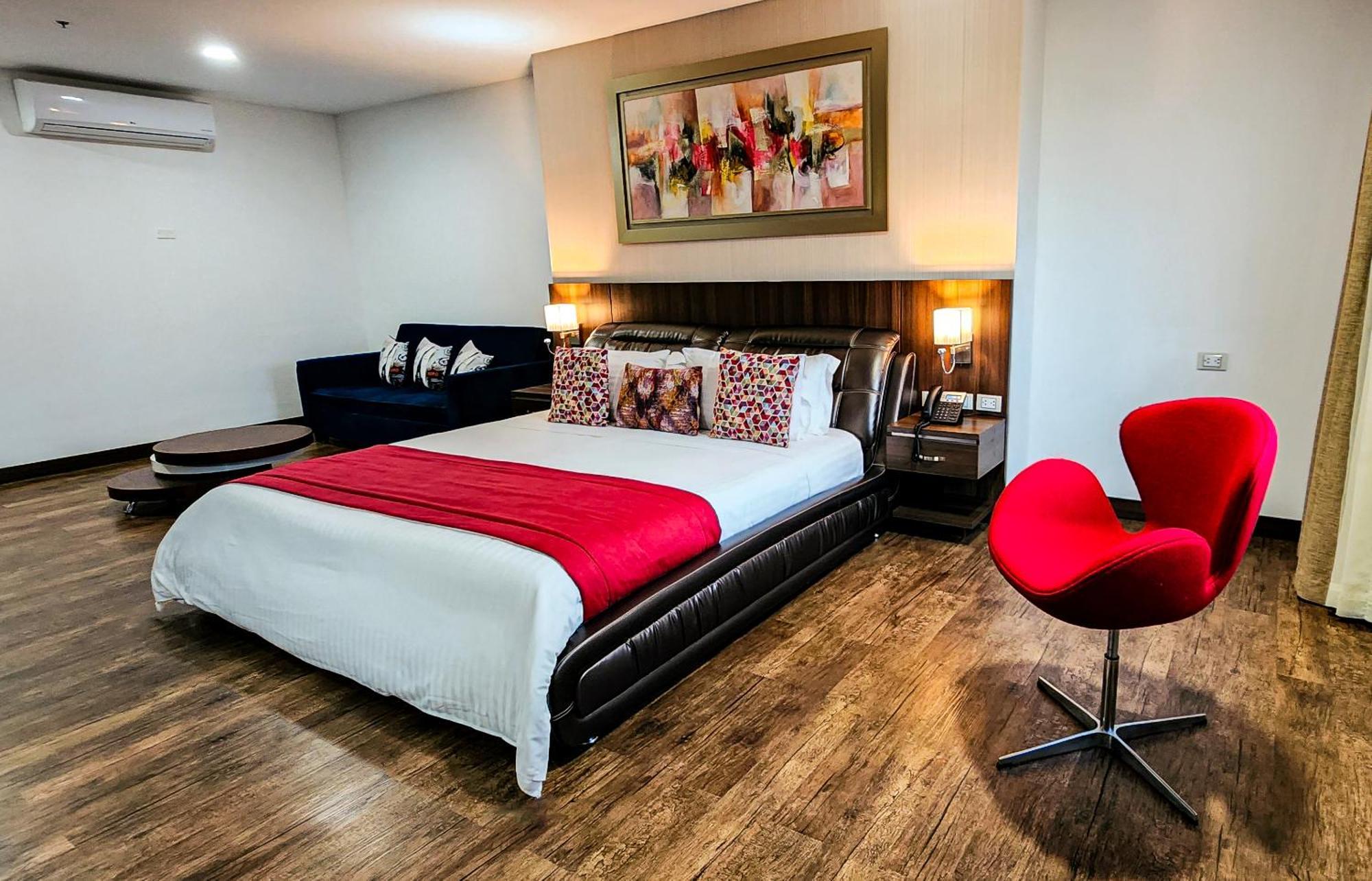 Hotel Royal Elim International Cali Εξωτερικό φωτογραφία A bedroom at the hotel