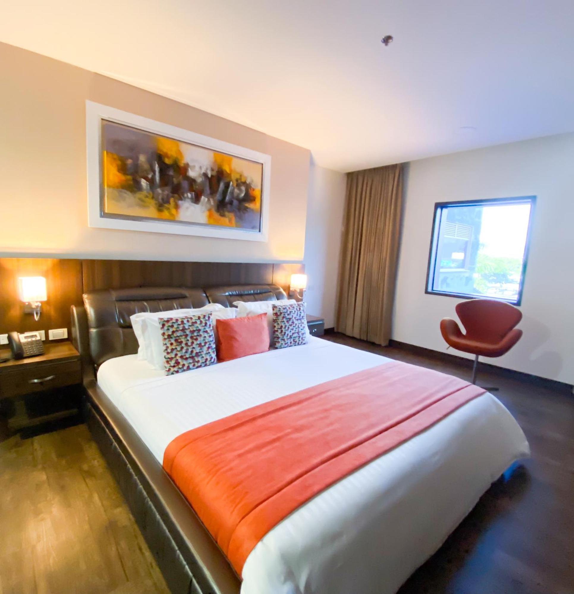 Hotel Royal Elim International Cali Εξωτερικό φωτογραφία A bedroom at the hotel
