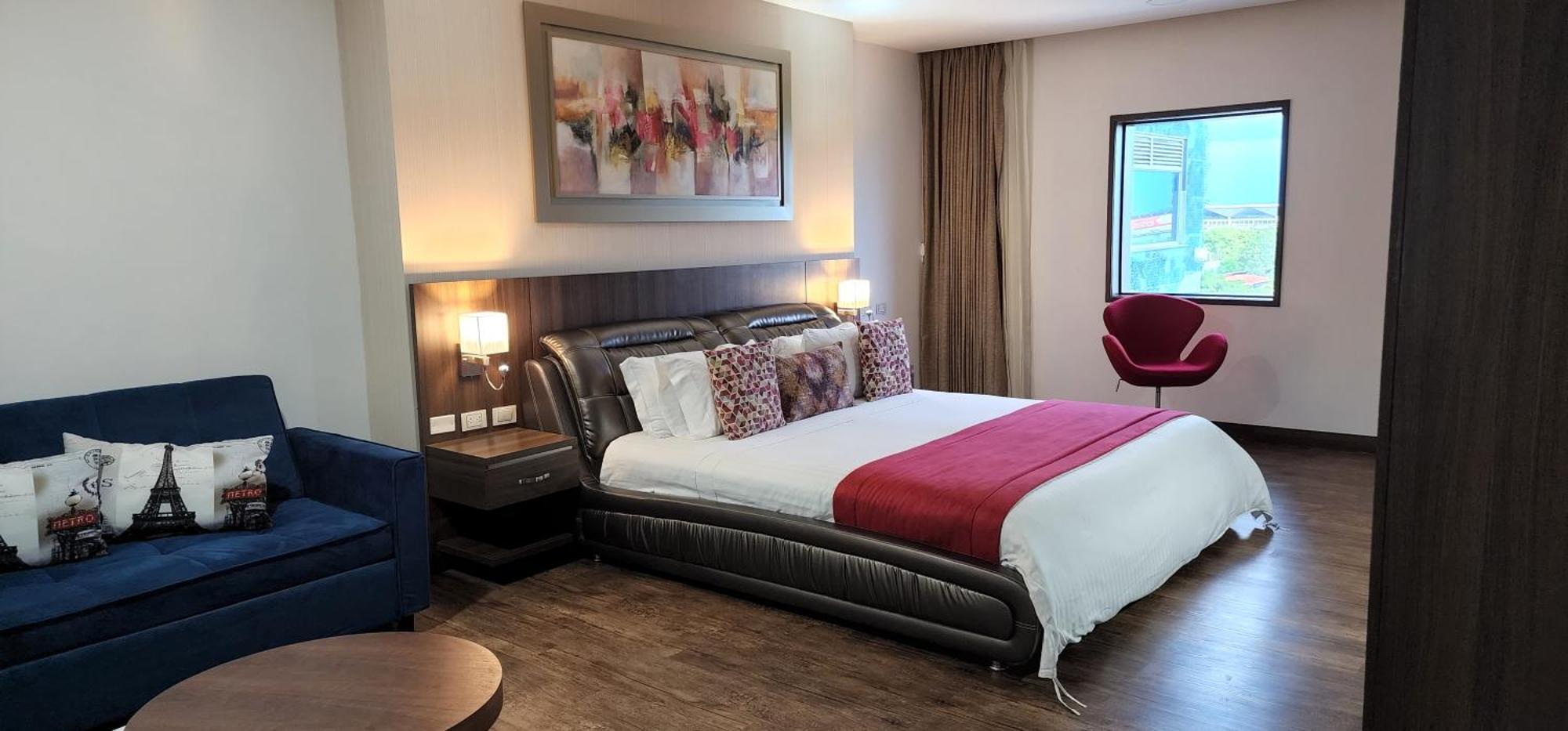 Hotel Royal Elim International Cali Εξωτερικό φωτογραφία A bedroom at the hotel
